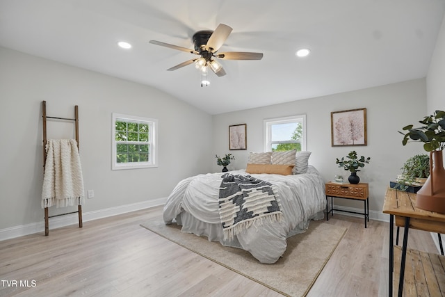 1225 Bristol View Dr, Bristol, VA 24201 - bedroom featuring multiple windows, light wood-style floors, vaulted ceiling, baseboards, and recessed lighting