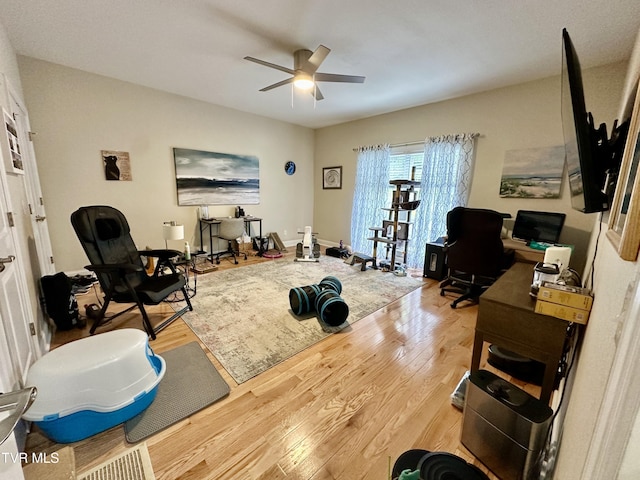 59 Whisper Bnd Unit 0, Johnson City, TN 37604 - living area with a desk, wood finished floors, and ceiling fan