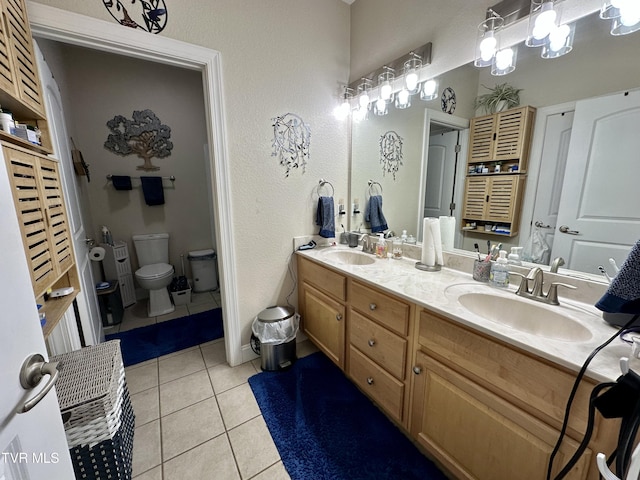 59 Whisper Bnd Unit 0, Johnson City, TN 37604 - bathroom with tile patterned flooring, double vanity, toilet, and baseboards