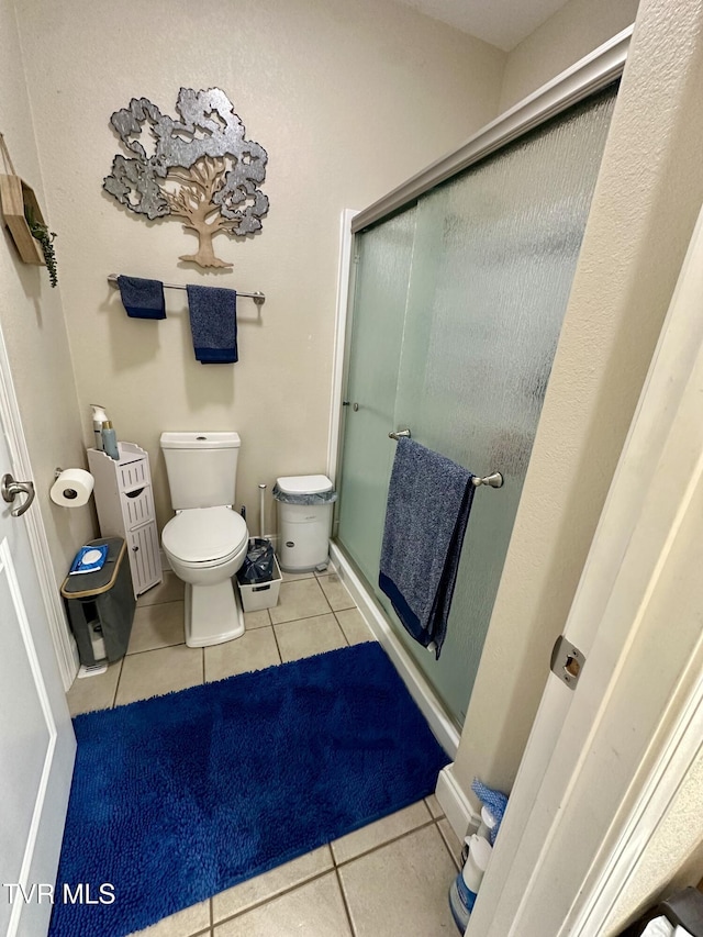 59 Whisper Bnd Unit 0, Johnson City, TN 37604 - bathroom featuring tile patterned flooring, a shower stall, and toilet