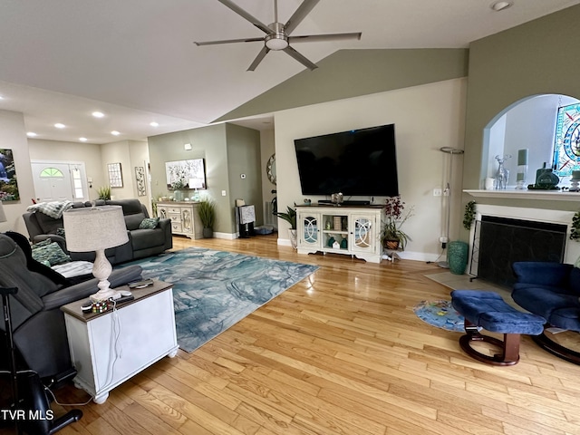 59 Whisper Bnd Unit 0, Johnson City, TN 37604 - living area featuring a ceiling fan, vaulted ceiling, a fireplace, wood finished floors, and baseboards