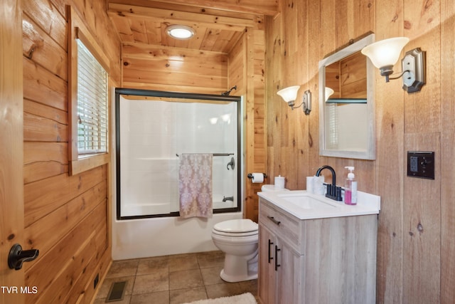 455 Boring Chapel Rd, Johnson City, TN 37615 - full bath with wooden walls, vanity, toilet, and shower / bath combination with glass door