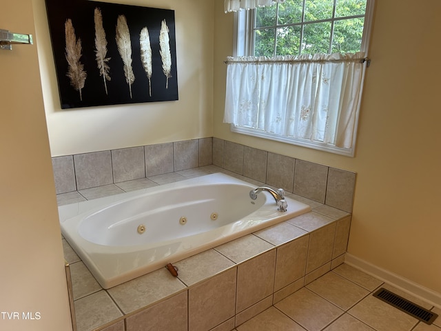 115 Butterfly Ct, Limestone, TN 37681 - bathroom with a jetted tub, tile patterned flooring, and baseboards