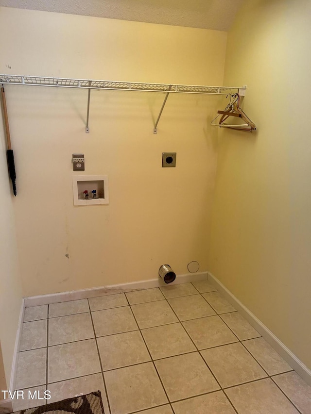 115 Butterfly Ct, Limestone, TN 37681 - laundry area with electric dryer hookup, washer hookup, light tile patterned floors, and baseboards