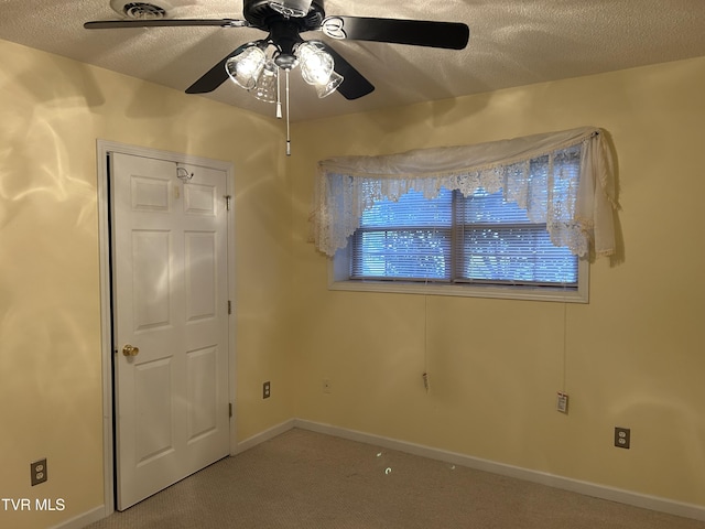 115 Butterfly Ct, Limestone, TN 37681 - unfurnished bedroom with carpet floors, a textured ceiling, ceiling fan, and baseboards