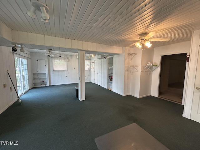 115 Butterfly Ct, Limestone, TN 37681 - unfurnished room featuring carpet flooring, ceiling fan, wooden ceiling, baseboards, and wooden walls
