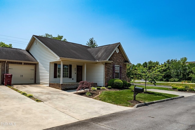 1010 Appaloosa Trl, Johnson City, TN 37604 - ranch-style home with concrete driveway, an attached garage, a front lawn, roof with shingles, and covered porch