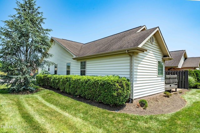 1010 Appaloosa Trl, Johnson City, TN 37604 - view of property exterior featuring roof with shingles and a yard