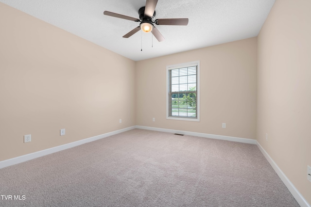 1010 Appaloosa Trl, Johnson City, TN 37604 - empty room featuring a ceiling fan, light colored carpet, and baseboards