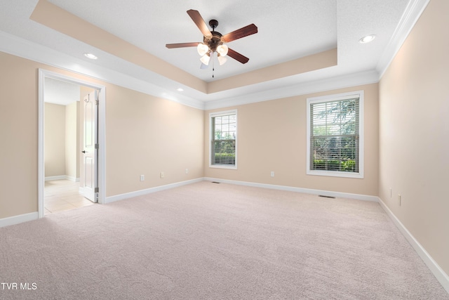 1010 Appaloosa Trl, Johnson City, TN 37604 - unfurnished room featuring light colored carpet, a tray ceiling, recessed lighting, ceiling fan, and baseboards
