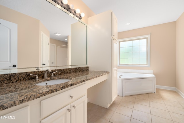 1010 Appaloosa Trl, Johnson City, TN 37604 - bathroom featuring vanity, baseboards, tile patterned flooring, and a bath