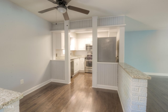 361 Belmont Dr Unit 14, Bristol, TN 37620 - kitchen with appliances with stainless steel finishes, ceiling fan, dark wood-style flooring, white cabinets, and light stone countertops