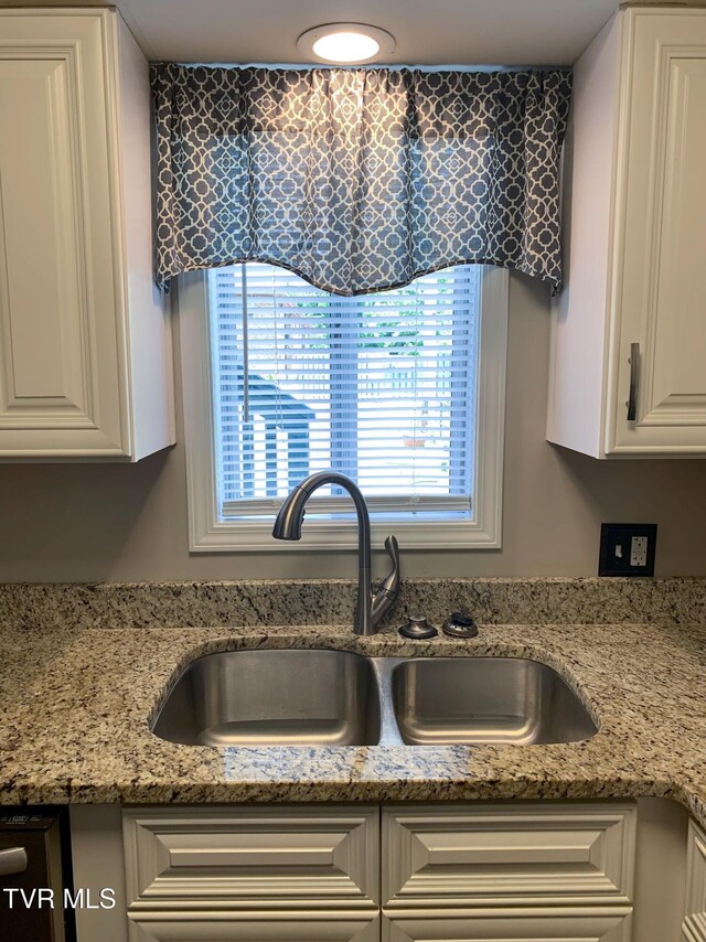 361 Belmont Dr Unit 14, Bristol, TN 37620 - kitchen featuring plenty of natural light, white cabinetry, and light stone countertops