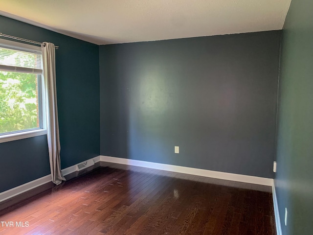 361 Belmont Dr Unit 14, Bristol, TN 37620 - empty room featuring dark wood-style flooring