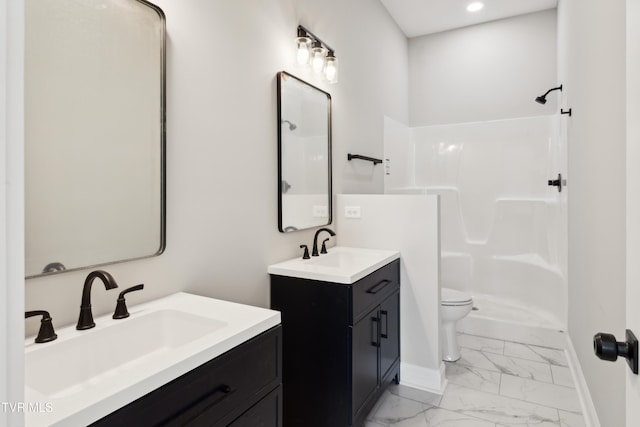 833 Granby Rd, Kingsport, TN 37660 - bathroom with marble finish flooring, two vanities, baseboards, toilet, and a shower