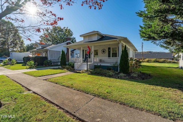215 Clinchfield Ave, Erwin, TN 37650 - bungalow featuring covered porch and a front lawn