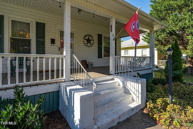 215 Clinchfield Ave, Erwin, TN 37650 - property entrance with a porch