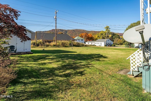 215 Clinchfield Ave, Erwin, TN 37650 - view of green lawn with an outdoor structure