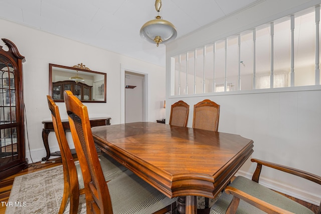 215 Clinchfield Ave, Erwin, TN 37650 - dining area with baseboards and wood finished floors