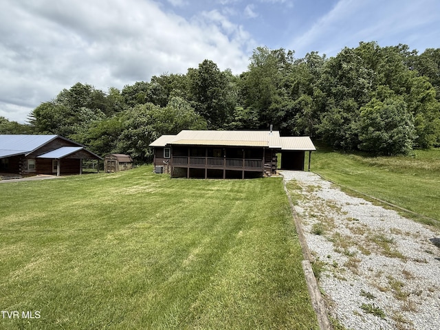 366 Judge Ben Allen Rd, Elizabethton, TN 37643 - view of front of property with a front yard, driveway, a pole building, an outbuilding, and metal roof