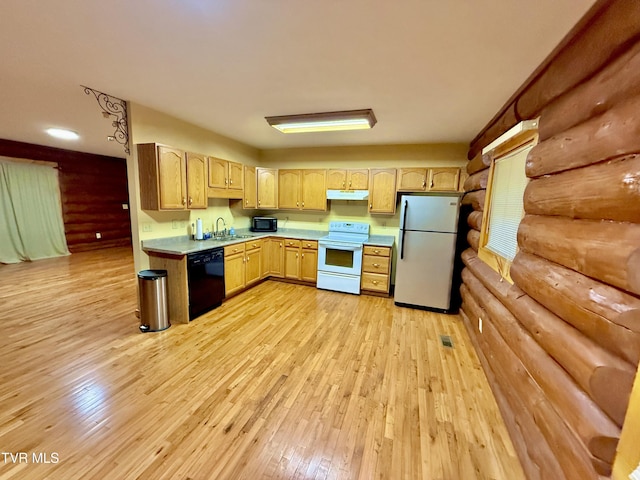 366 Judge Ben Allen Rd, Elizabethton, TN 37643 - kitchen with black appliances, under cabinet range hood, light countertops, a sink, and light wood-type flooring