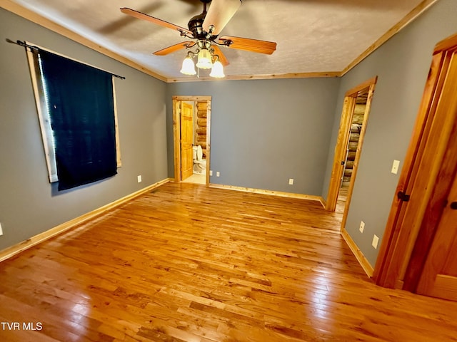 366 Judge Ben Allen Rd, Elizabethton, TN 37643 - spare room with hardwood / wood-style flooring, ceiling fan, crown molding, and baseboards