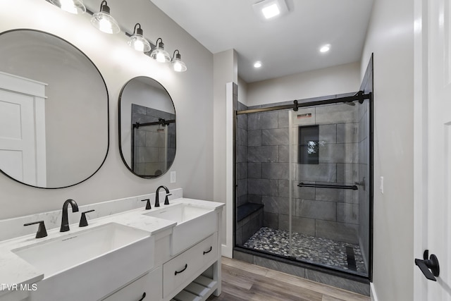 5980 Snapps Ferry Rd, Afton, TN 37616 - full bath with double vanity, wood finished floors, a stall shower, and recessed lighting