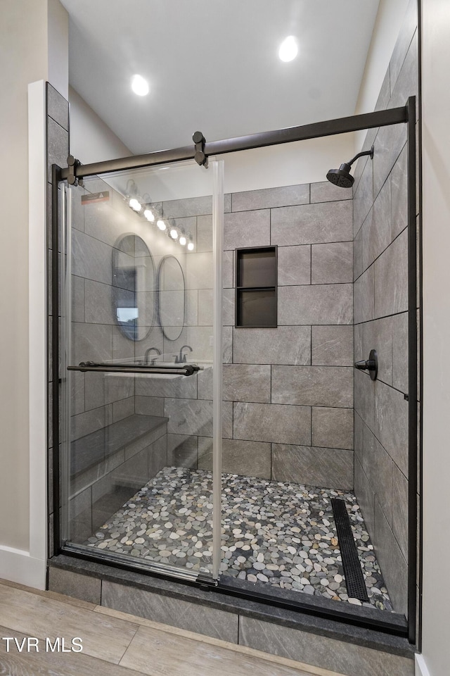 5980 Snapps Ferry Rd, Afton, TN 37616 - full bath featuring a stall shower, baseboards, wood finished floors, and recessed lighting