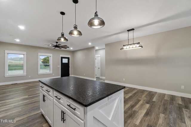 5980 Snapps Ferry Rd, Afton, TN 37616 - kitchen featuring open floor plan, dark countertops, white cabinets, dark wood-type flooring, and recessed lighting