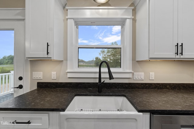 5980 Snapps Ferry Rd, Afton, TN 37616 - kitchen with stainless steel dishwasher, a sink, white cabinets, and dark stone countertops