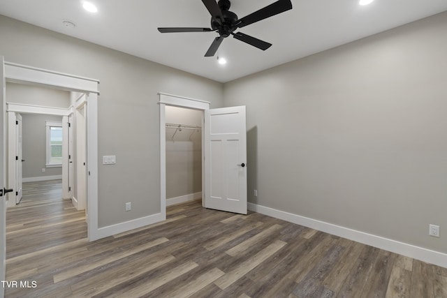 5980 Snapps Ferry Rd, Afton, TN 37616 - unfurnished bedroom with recessed lighting, baseboards, wood finished floors, a closet, and a ceiling fan