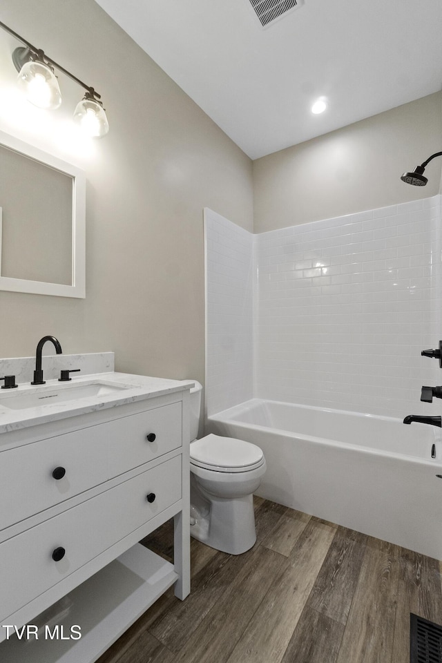5980 Snapps Ferry Rd, Afton, TN 37616 - bathroom with wood finished floors, toilet, vanity, and shower / tub combination