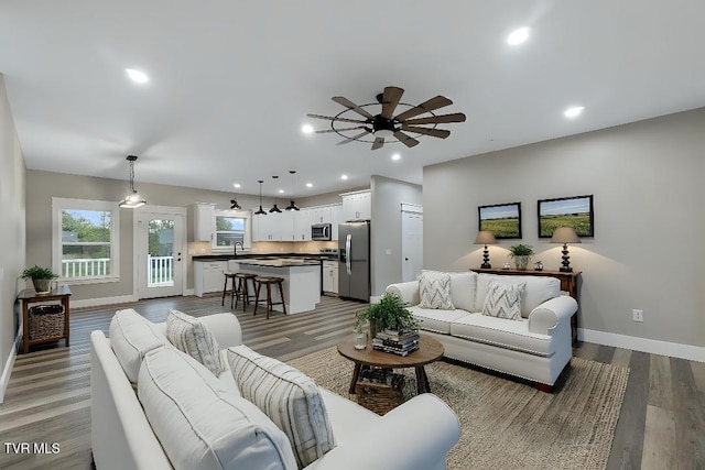 5980 Snapps Ferry Rd, Afton, TN 37616 - living room with wood finished floors, baseboards, ceiling fan, and recessed lighting