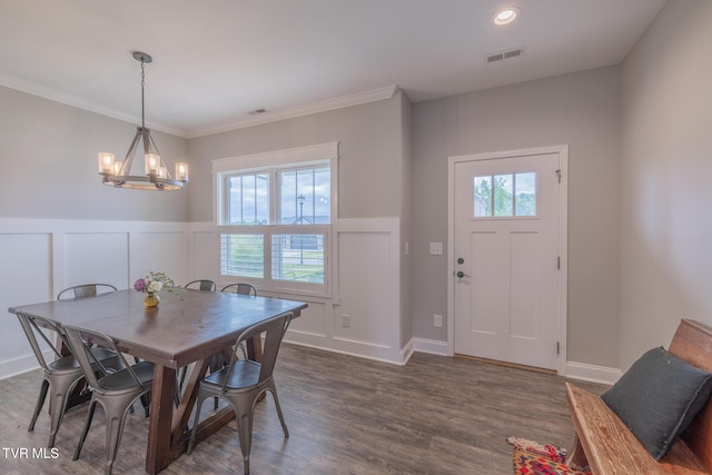4073 Maize Pl, Piney Flats, TN 37686 - dining room with a chandelier, a wainscoted wall, a decorative wall, dark wood-type flooring, and crown molding