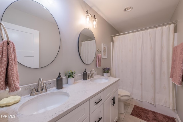 4073 Maize Pl, Piney Flats, TN 37686 - full bath with double vanity, toilet, and tile patterned floors