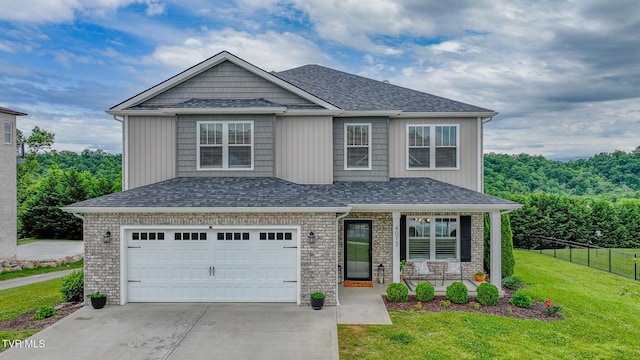 4073 Maize Pl, Piney Flats, TN 37686 - craftsman-style house with a porch, a garage, and concrete driveway