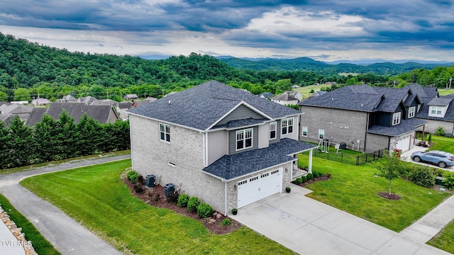 4073 Maize Pl, Piney Flats, TN 37686 - aerial perspective of suburban area with a mountainous background