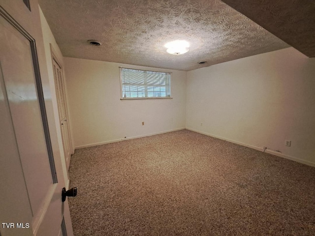 226 Heritage Hills Dr, Greeneville, TN 37745 - unfurnished bedroom featuring carpet floors, a textured ceiling, and baseboards