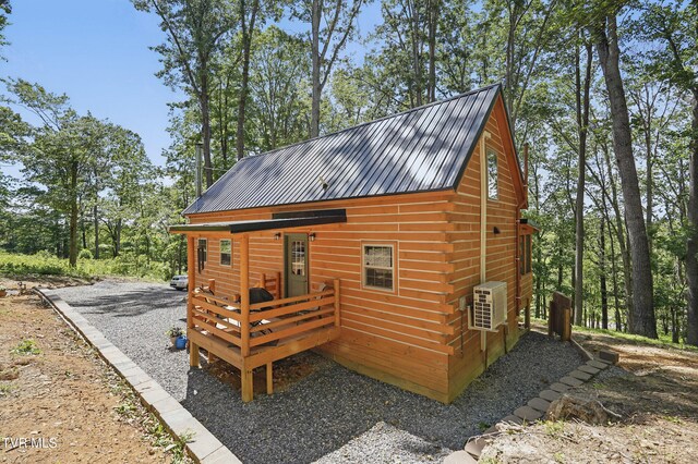 166 Booher Rd, Jonesborough, TN 37659 - view of property exterior featuring metal roof and a deck