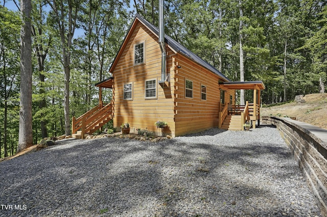 166 Booher Rd, Jonesborough, TN 37659 - view of side of property featuring stairs and view of scattered trees