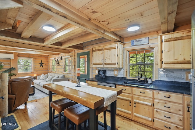 166 Booher Rd, Jonesborough, TN 37659 - kitchen with wood ceiling with exposed beams, a sink, an AC wall unit, light wood-style flooring, and dark countertops