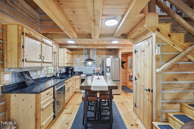 166 Booher Rd, Jonesborough, TN 37659 - kitchen featuring wall chimney exhaust hood, a sink, appliances with stainless steel finishes, light wood finished floors, and decorative backsplash