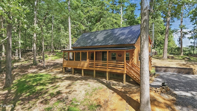166 Booher Rd, Jonesborough, TN 37659 - rustic home with metal roof and covered porch