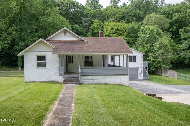1416 E Cedar St, Bristol, TN 37620 - view of front of property with a porch, a chimney, and roof with shingles