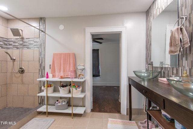 1416 E Cedar St, Bristol, TN 37620 - bathroom featuring a tile shower, double vanity, and tile patterned floors