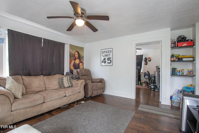 1416 E Cedar St, Bristol, TN 37620 - living room featuring a ceiling fan, wood finished floors, and baseboards