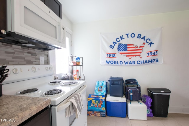1416 E Cedar St, Bristol, TN 37620 - kitchen featuring white appliances, light tile patterned flooring, and backsplash