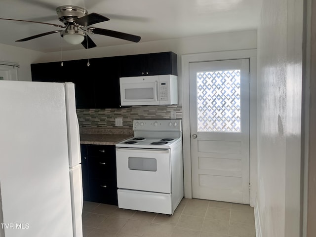 1416 E Cedar St, Bristol, TN 37620 - kitchen featuring white appliances, light tile patterned flooring, a ceiling fan, tasteful backsplash, and dark cabinetry
