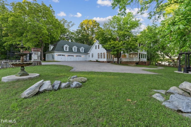 133 Knob Creek Dock Rd, Johnson City, TN 37601 - view of grassy yard featuring driveway and a garage