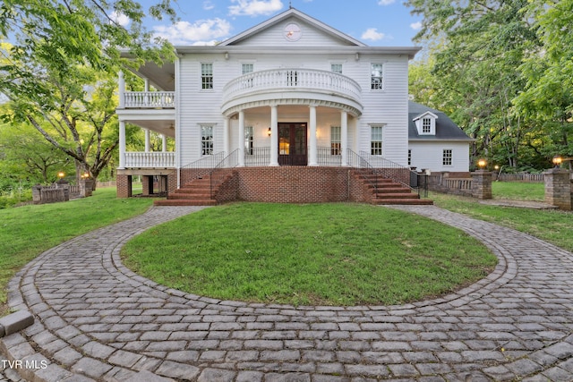 133 Knob Creek Dock Rd, Johnson City, TN 37601 - back of property featuring a balcony, a porch, stairs, and french doors